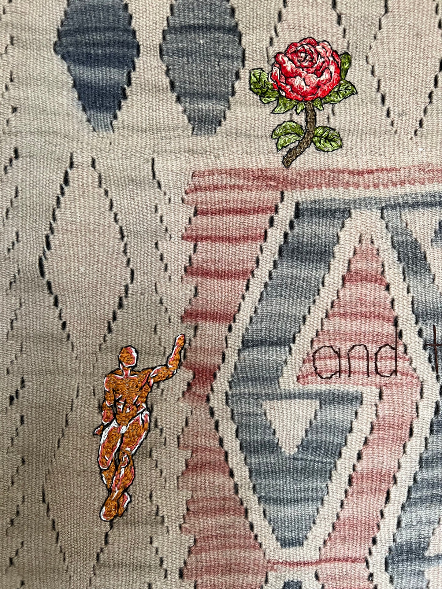 a woman, a man, and two roses.
