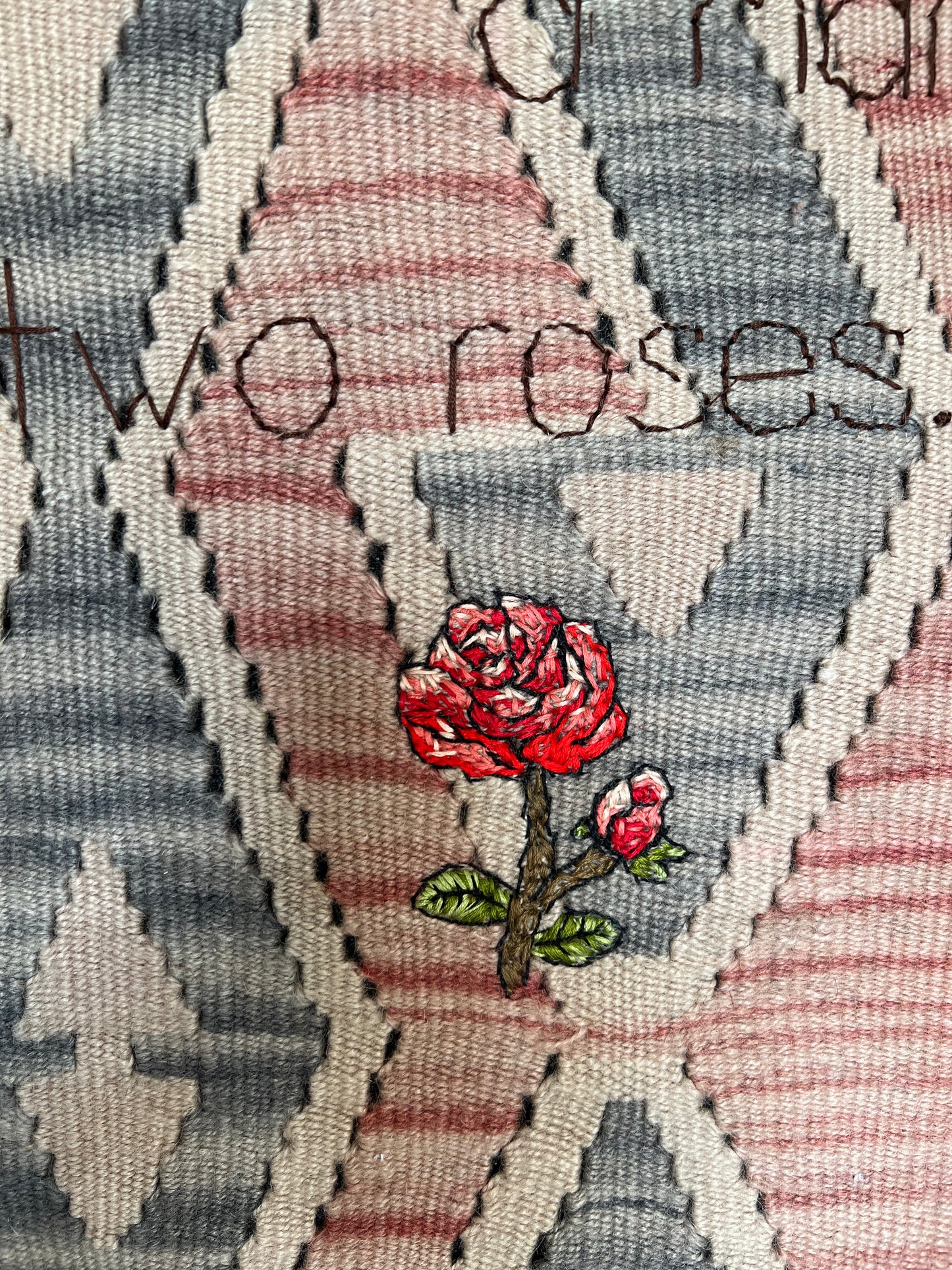 a woman, a man, and two roses.