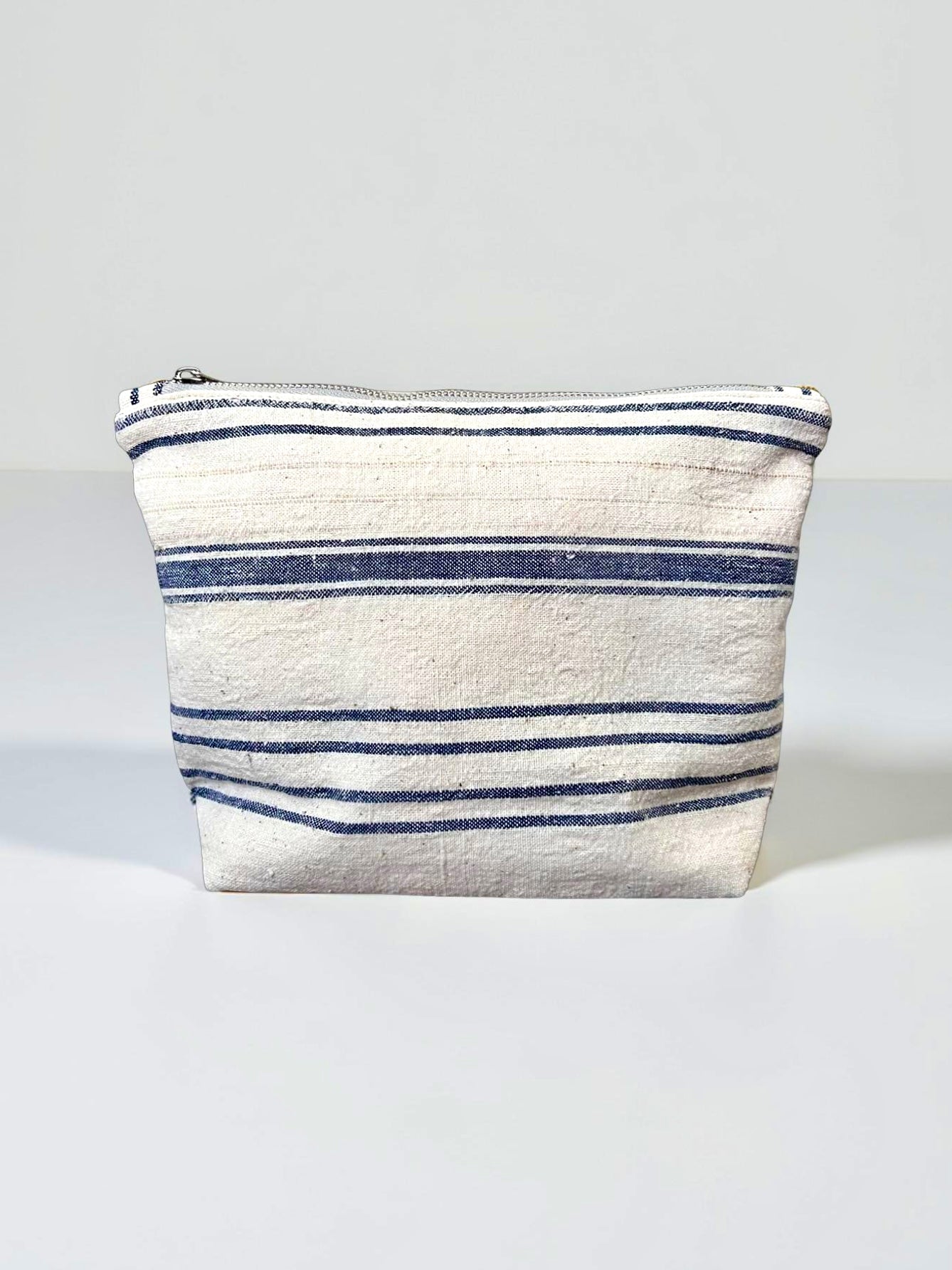 Blue, white striped Kandıra fabric clutch handmade in Turkey by Esra Kayıra brand

