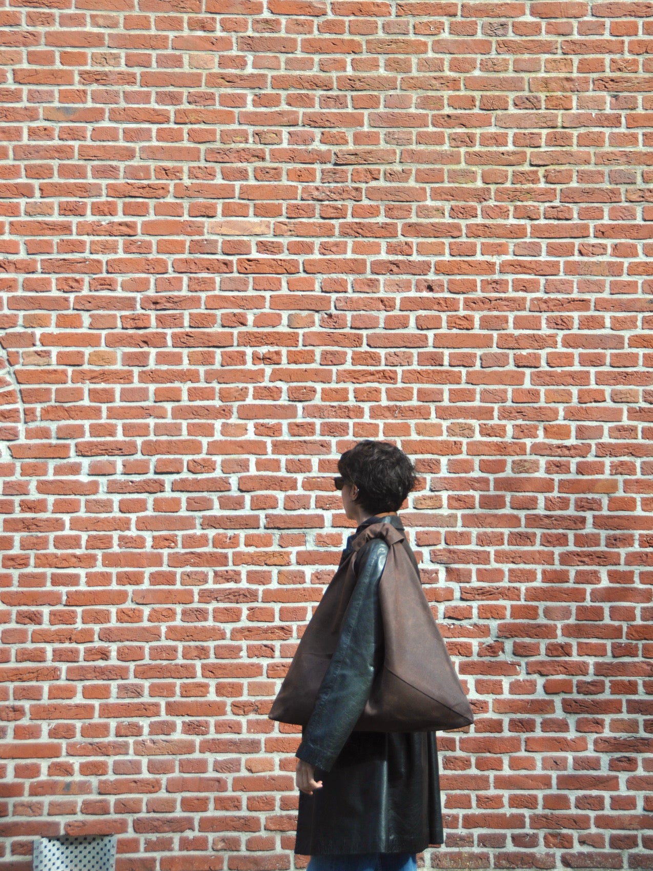 Dark brown waxed canvas origami midi bag handcrafted in Turkey by Esra Kayira brand
