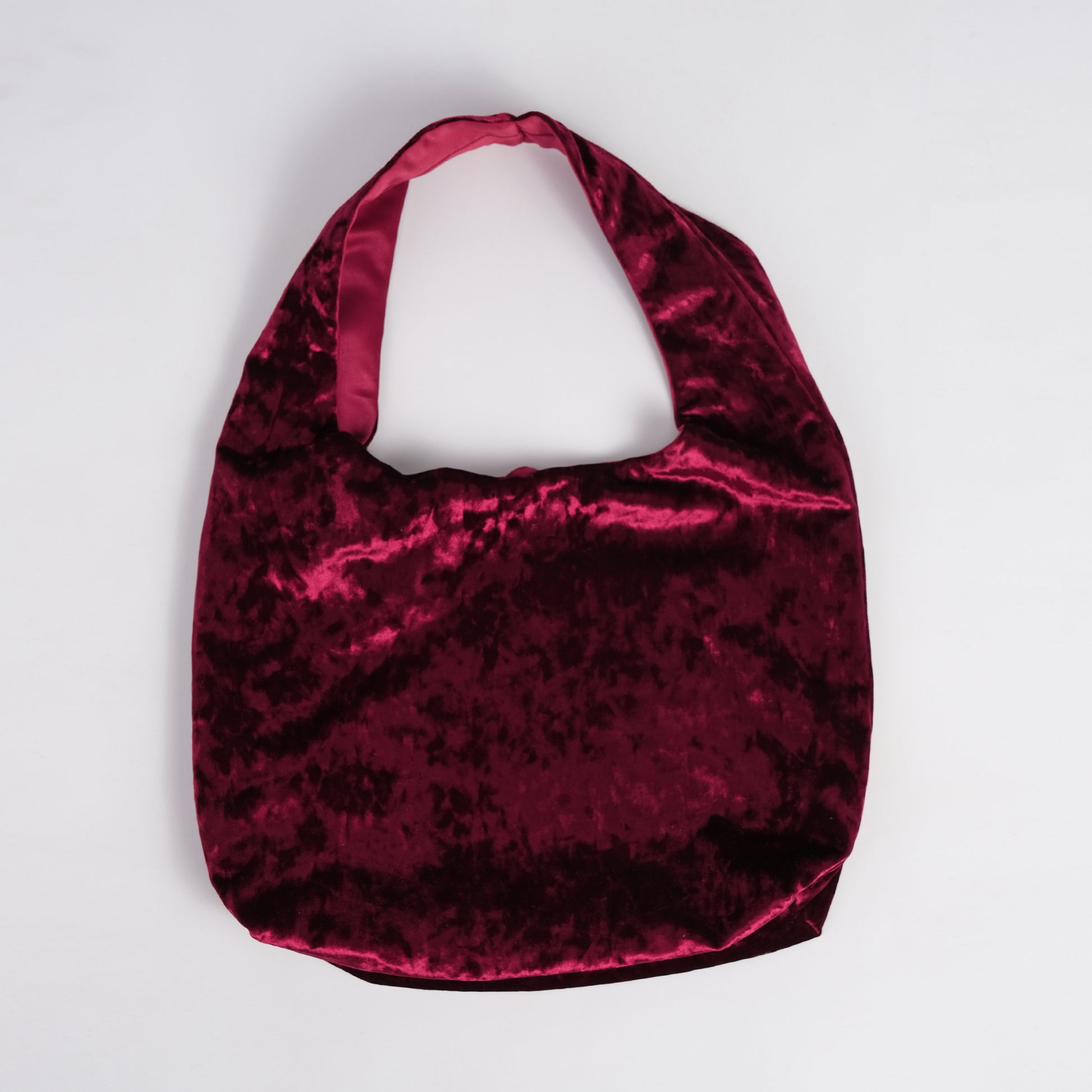 Burgundy crushed velvet bag handmade in Turkey, flat on white background, Esra Kayira brand. 