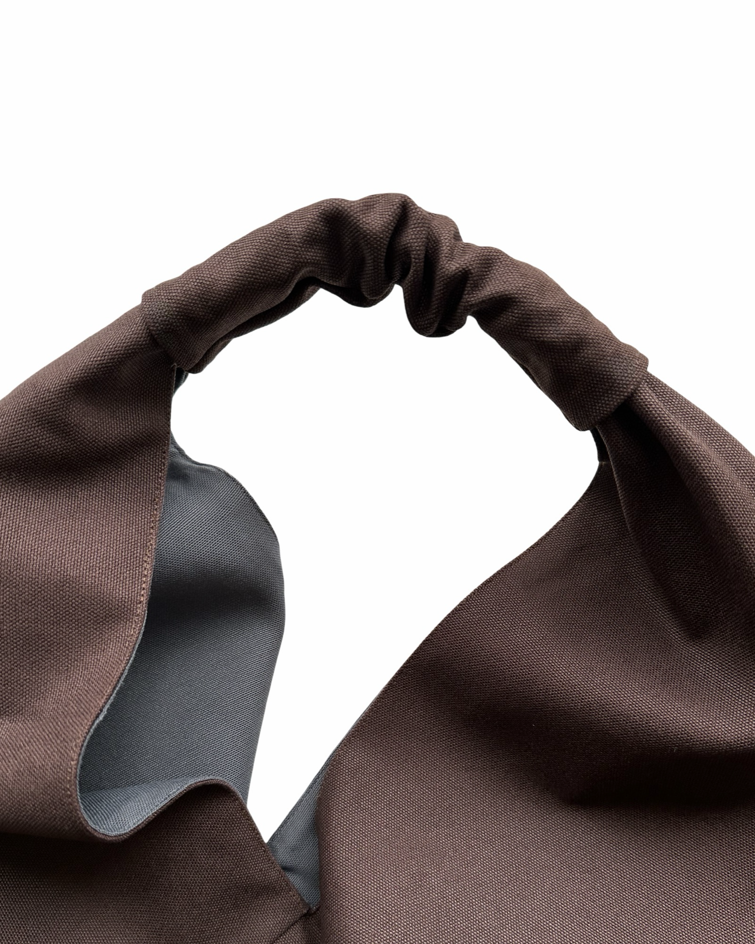 Dark brown, midi size canvas origami bag handmade in Turkey, detail, by Esra Kayira brand. 