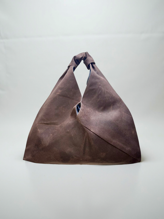 Brown waxed canvas origami midi bag handcrafted in Turkey by Esra Kayira
