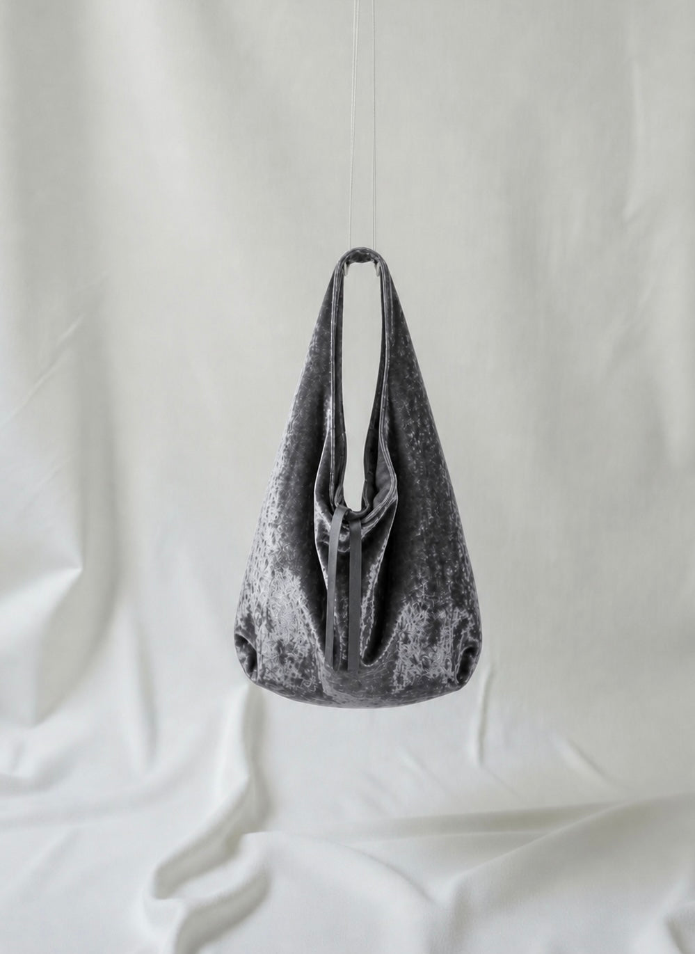 Gray over the shoulder bag, crushed velvet fabric, part of Esra Kayira collection