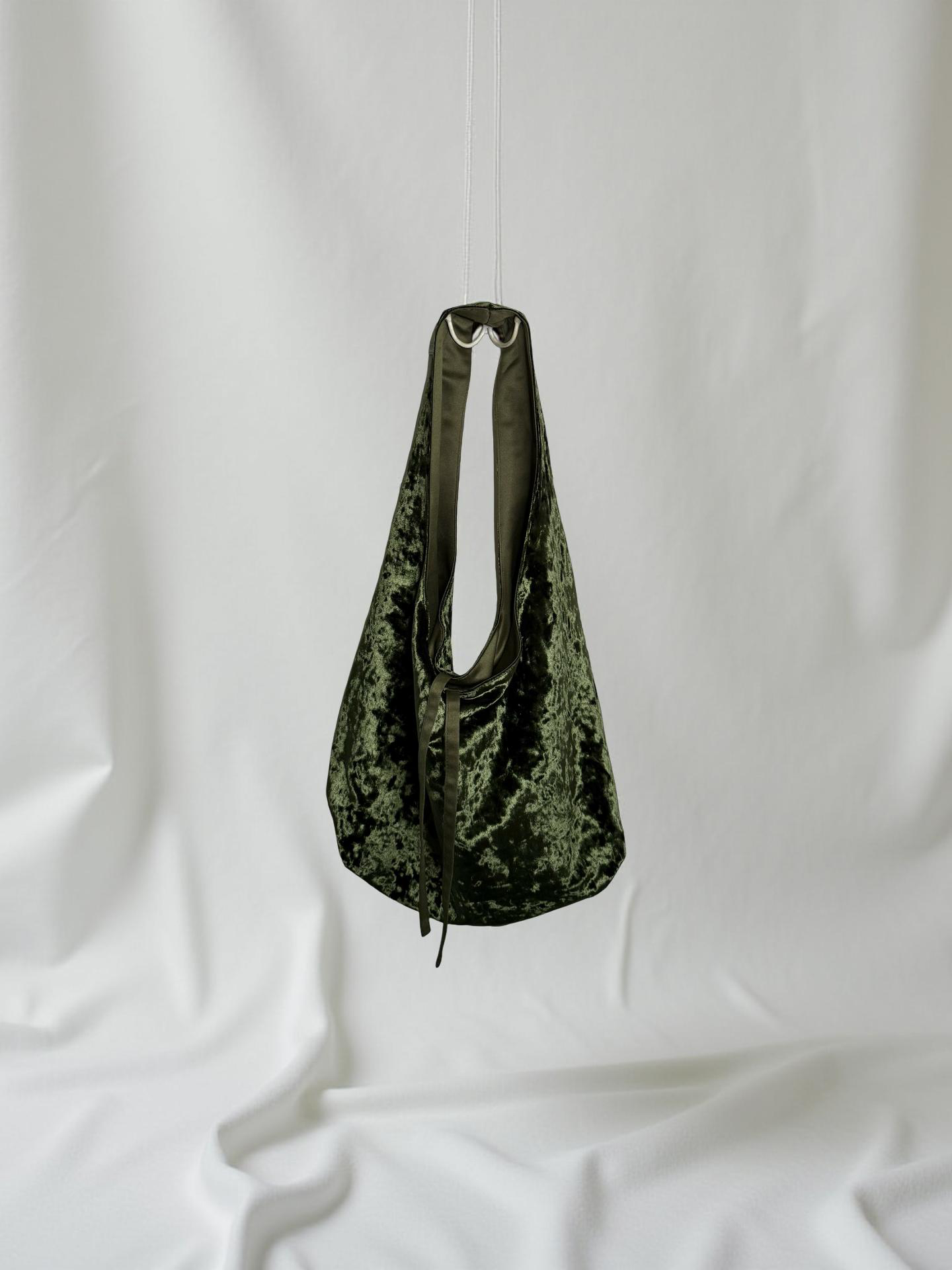 Green crushed velvet bag handmade in Turkey, Esra Kayira brand.
