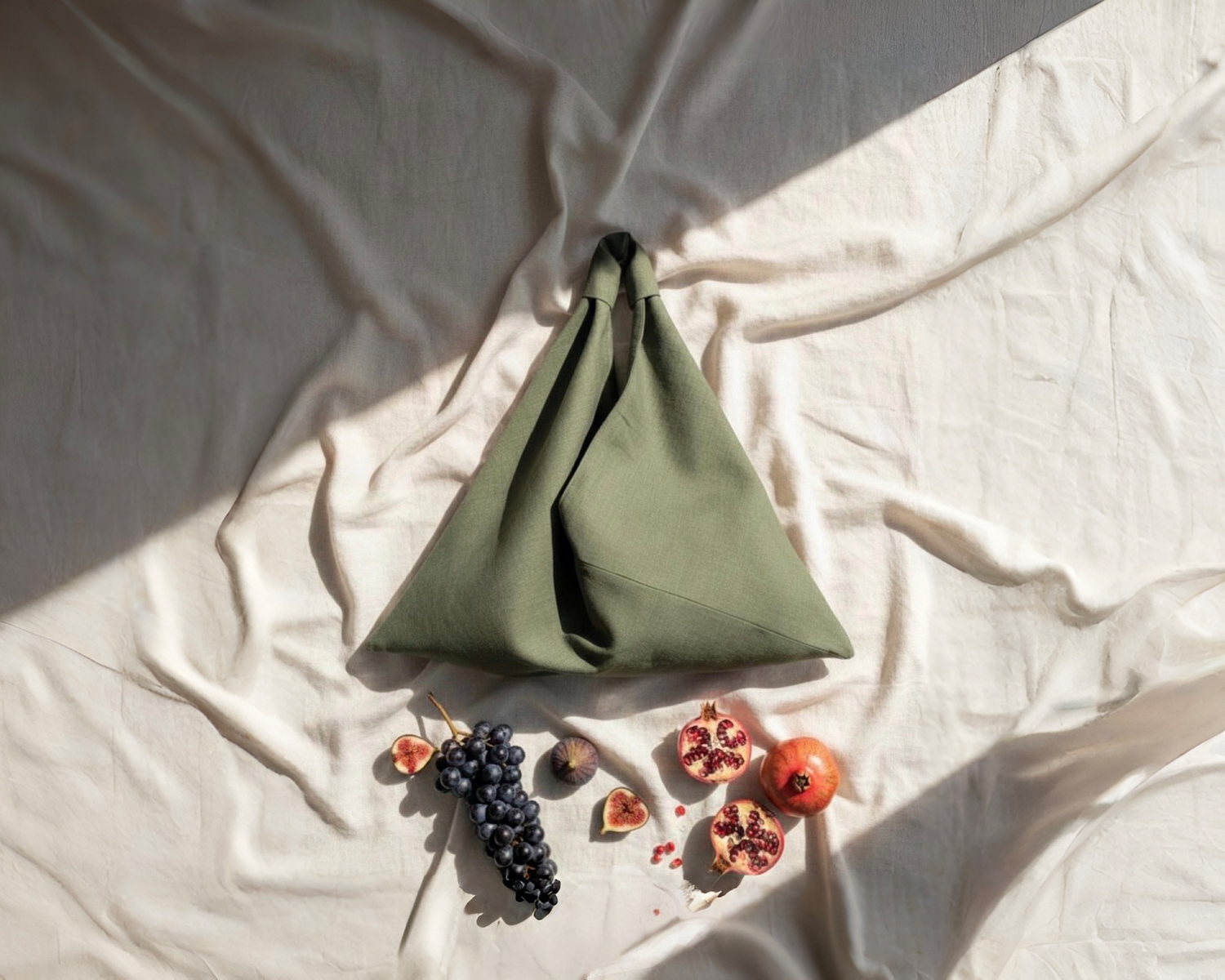 Midi origami bag on a fabric background