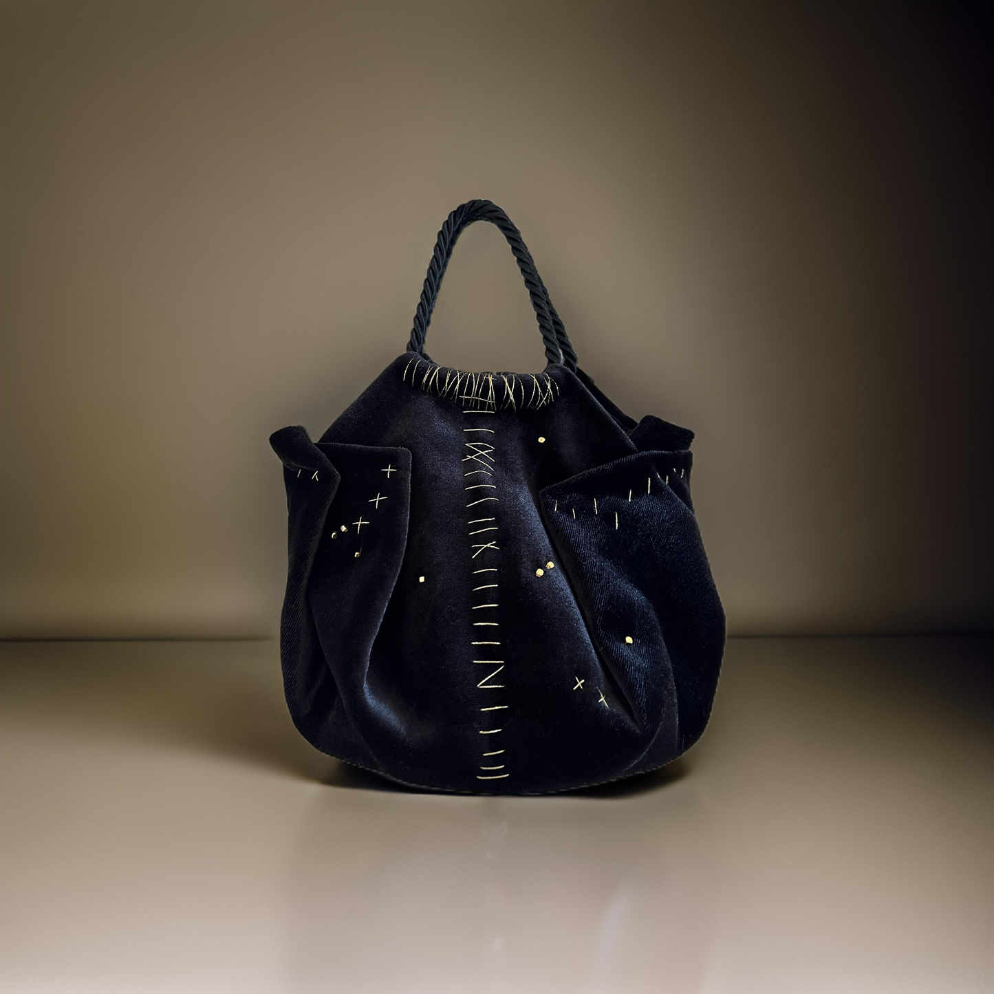 Mini black velvet bag with gold detail, handmade in Turkey by Esra Kayıra