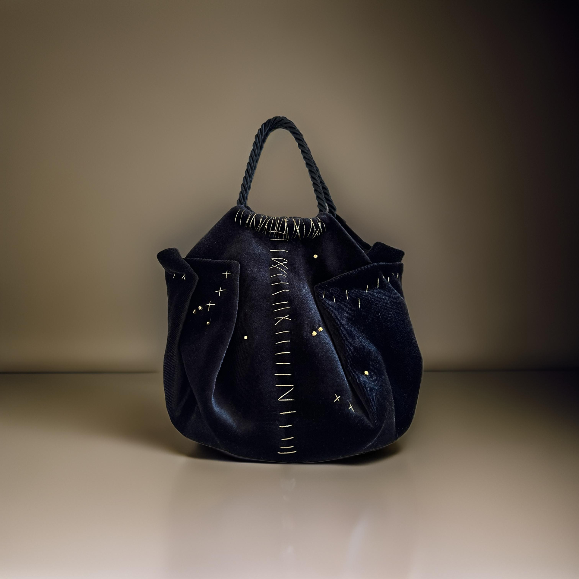 Mini black velvet bag with gold detail, handmade in Turkey by Esra Kayıra