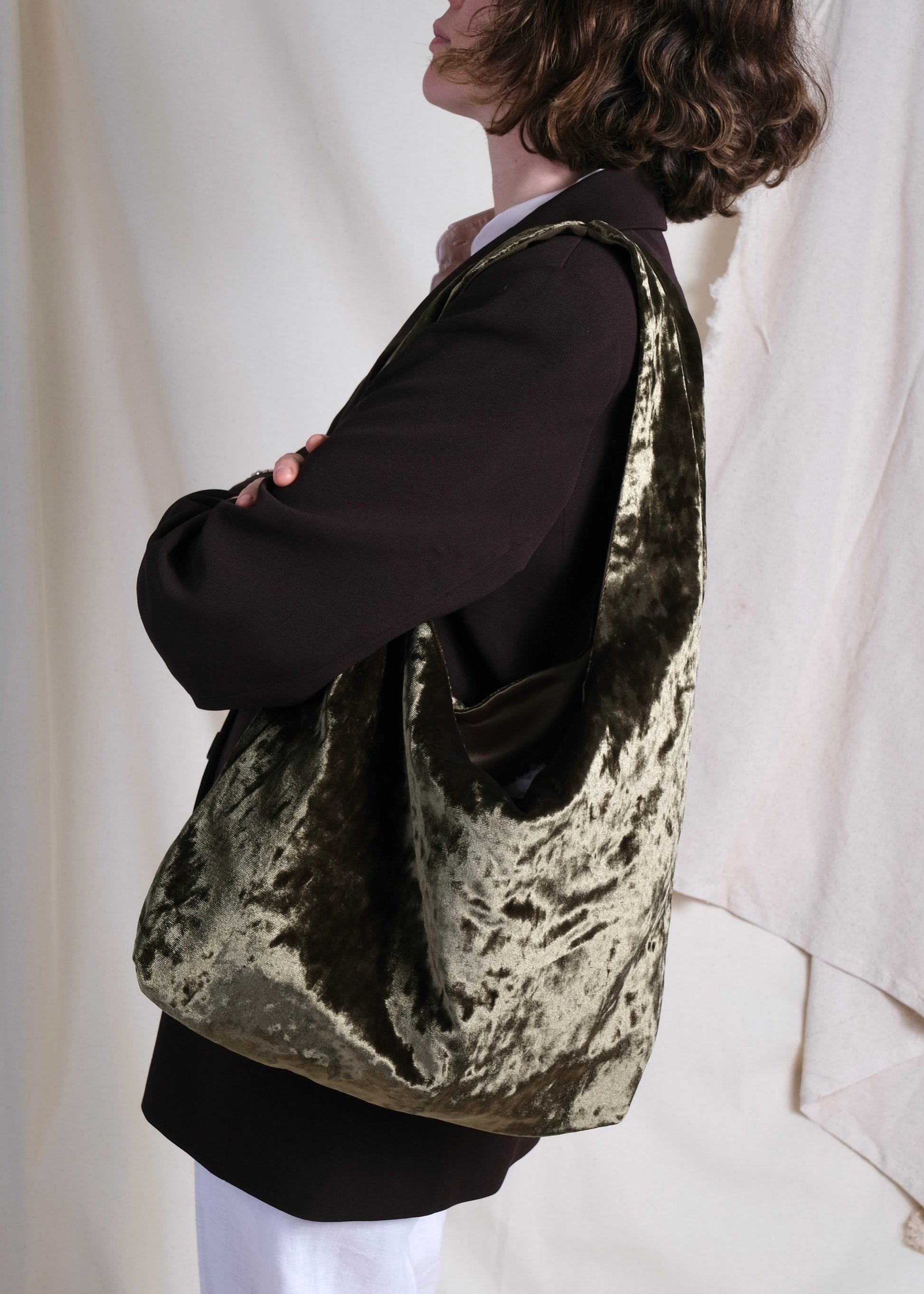 Olive green crushed velvet over the shoulder bag handmade in Turkey, model shoot, Esra Kayira brand.