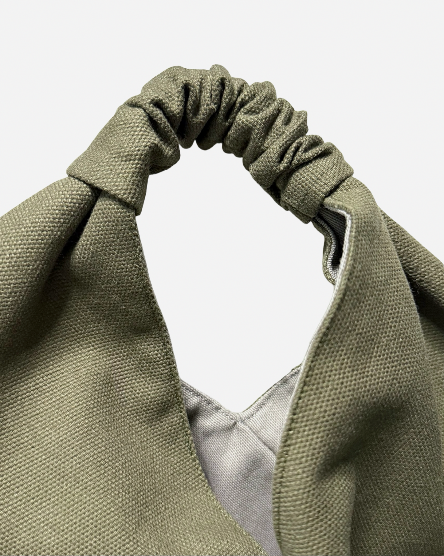 Olive green, mini size canvas origami bag handmade in Turkey, detail, by Esra Kayira brand. 