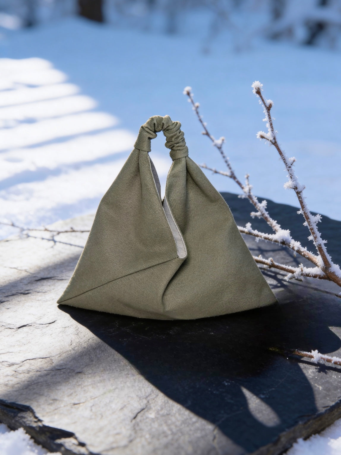 Olive green, mini size canvas origami bag handmade in Turkey, lifestyle shoot, by Esra Kayira brand. 
