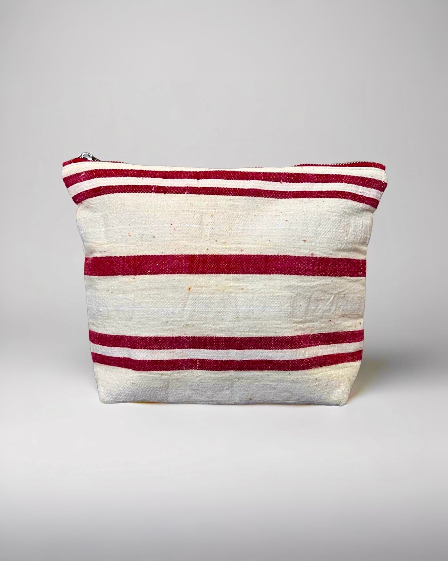 Red, white striped Kandıra fabric clutch handmade in Turkey by Esra Kayıra brand.

